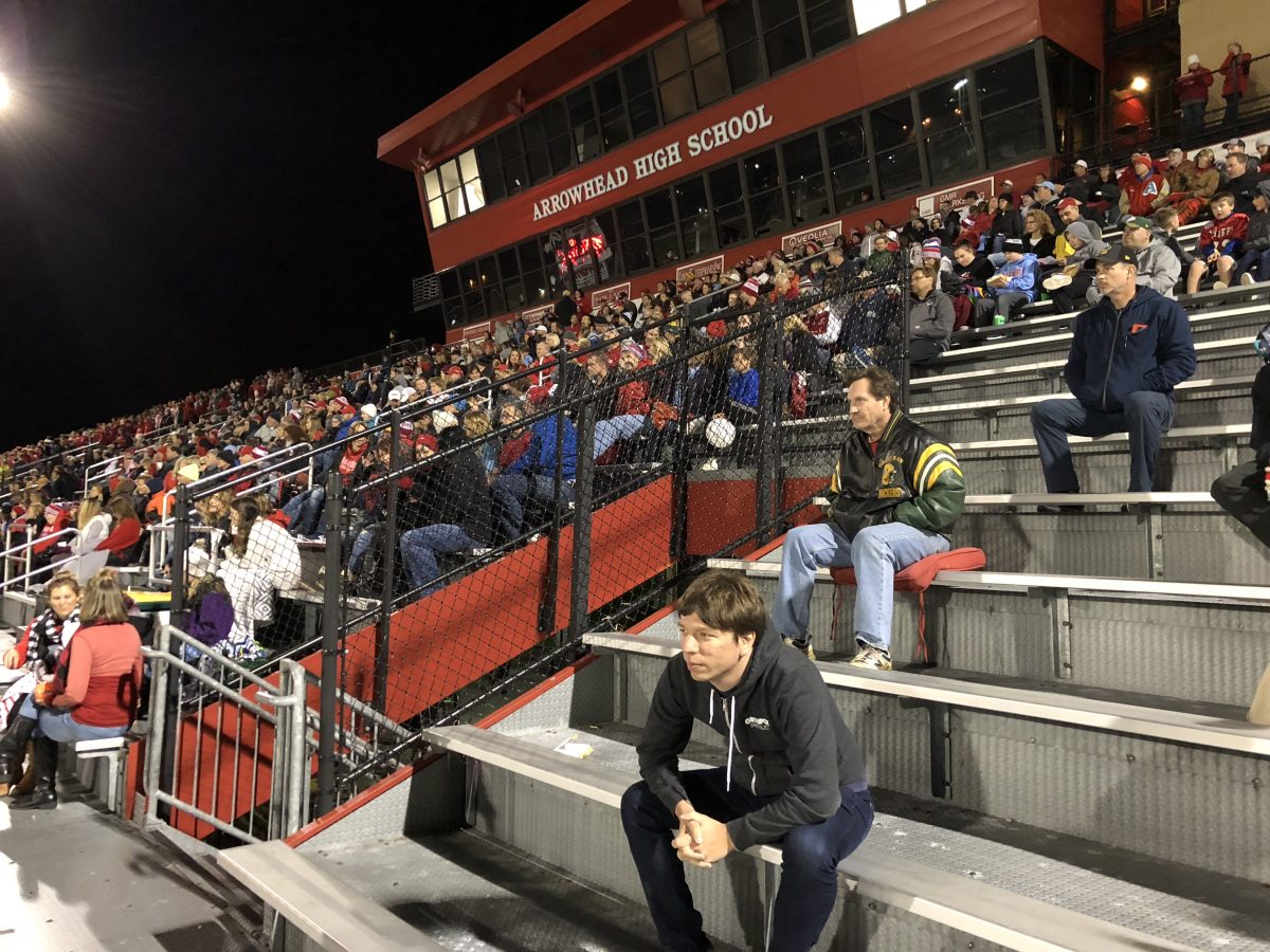 Intensely watching the Homecoming game (for 0.7 seconds)