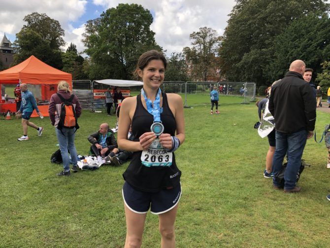 Becca with her marathon medal